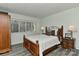 Bright bedroom with wooden bed frame and large window at 51 Old Post Rd, Lake Wylie, SC 29710