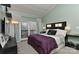 Main bedroom with plush bedding and private balcony access at 51 Old Post Rd, Lake Wylie, SC 29710