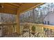 Private deck with wooden railings and wooded views at 51 Old Post Rd, Lake Wylie, SC 29710