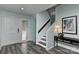 Bright entryway with stairs, light grey walls, and wood-look floors at 51 Old Post Rd, Lake Wylie, SC 29710