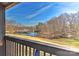 Stunning lake view from private balcony with wooden railing at 51 Old Post Rd, Lake Wylie, SC 29710