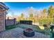 Private backyard with fire pit and patio area at 5110 Pansley Dr, Charlotte, NC 28226