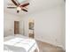 Bedroom with ceiling fan, access to bathroom, and neutral decor at 5110 Pansley Dr, Charlotte, NC 28226