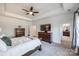 Bright bedroom with a large window, ceiling fan and an ensuite bathroom at 5110 Pansley Dr, Charlotte, NC 28226