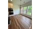 Charming breakfast nook with natural light and built-in double oven at 5110 Pansley Dr, Charlotte, NC 28226