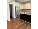 Modern kitchen with stainless steel appliances, granite countertops, and ample cabinet space at 5110 Pansley Dr, Charlotte, NC 28226