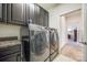 Laundry room with washer, dryer, and additional storage at 5110 Pansley Dr, Charlotte, NC 28226