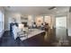 Open concept living area with views to dining and kitchen at 5110 Pansley Dr, Charlotte, NC 28226