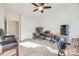 Spacious home office with two desks and ceiling fan at 5110 Pansley Dr, Charlotte, NC 28226