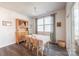 Bright dining area with hardwood floors, a wooden hutch, and access to a deck at 5120 Kings Pinnacle Dr, Kings Mountain, NC 28086