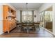 Dining room features hardwood floors, a wooden hutch, and access to a deck at 5120 Kings Pinnacle Dr, Kings Mountain, NC 28086