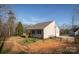 House back view, deck, and fenced yard at 5120 Kings Pinnacle Dr, Kings Mountain, NC 28086