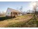 House exterior with backyard and wooden deck at 5120 Kings Pinnacle Dr, Kings Mountain, NC 28086