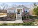 Front of house, stone accents, and landscaping at 5120 Kings Pinnacle Dr, Kings Mountain, NC 28086