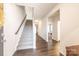 Stylish carpeted staircase in a light-filled hallway at 5120 Kings Pinnacle Dr, Kings Mountain, NC 28086