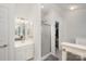 Clean bathroom with shower, vanity, and linen closet at 6239 Oxwynn Ln, Charlotte, NC 28270