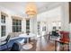 Kitchen dining area with built-in bench seating and large windows at 6239 Oxwynn Ln, Charlotte, NC 28270