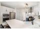 Modern kitchen with stainless steel appliances and white quartz countertops at 6239 Oxwynn Ln, Charlotte, NC 28270