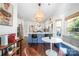 Bright kitchen with breakfast nook and stylish island at 6239 Oxwynn Ln, Charlotte, NC 28270