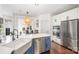 Updated kitchen with stainless steel appliances and island at 6239 Oxwynn Ln, Charlotte, NC 28270