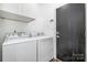 Convenient laundry room with washer and dryer hookups at 6239 Oxwynn Ln, Charlotte, NC 28270