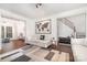 Living room with hardwood floors and access to the kitchen at 6239 Oxwynn Ln, Charlotte, NC 28270