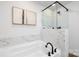 Relaxing bathroom featuring soaking tub and walk-in shower at 7420 Gwynne Cir, Charlotte, NC 28214