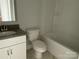 Bright bathroom featuring a combination tub and shower, a modern vanity and a toilet at 1312 Walter Taylor Way # Eqx0104, Charlotte, NC 28206