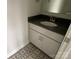 Stylish powder room featuring patterned floor tile, modern fixtures, and crisp white walls at 1312 Walter Taylor Way # Eqx0104, Charlotte, NC 28206
