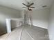 Unfinished bonus room with natural light, ceiling fan and ladder for easy customization at 1316 Walter Taylor Way # Eqx0103, Charlotte, NC 28206