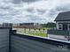 View from townhome deck of surrounding construction and commercial businesses at 1320 Walter Taylor Way # Eqx0102, Charlotte, NC 28206