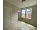 Bright bedroom with large windows and plenty of natural light at 1324 Walter Taylor Way # Eqx0101, Charlotte, NC 28206