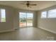 Bright bedroom with sliding glass doors and a large window, allowing for ample natural light at 1324 Walter Taylor Way # Eqx0101, Charlotte, NC 28206