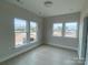 Bright bedroom with large windows and light wood flooring at 1324 Walter Taylor Way # Eqx0101, Charlotte, NC 28206