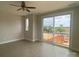 Bedroom with a ceiling fan, a large sliding glass door and a large window, allowing ample natural light at 1324 Walter Taylor Way # Eqx0101, Charlotte, NC 28206