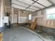 Spacious garage with high ceilings, a window, and an automatic door opener at 1324 Walter Taylor Way # Eqx0101, Charlotte, NC 28206