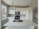 Modern kitchen with marble countertops, stainless steel appliances, and pendant lighting at 1324 Walter Taylor Way # Eqx0101, Charlotte, NC 28206