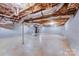 Unfinished basement featuring concrete floor, block walls, exposed insulation, and ductwork at 150 Windmill Ct, Harmony, NC 28634