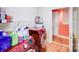 Efficient laundry room with washer, dryer, storage shelving, and wood look floors at 150 Windmill Ct, Harmony, NC 28634