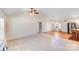 Spacious living room with tile flooring, high ceilings, and natural light, perfect for entertaining and relaxation at 150 Windmill Ct, Harmony, NC 28634