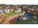 Aerial view of luxury waterfront home with private dock at 18805 Flat Shoals Dr, Cornelius, NC 28031