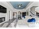 Finished basement with wet bar and comfortable seating at 18805 Flat Shoals Dr, Cornelius, NC 28031