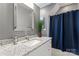 Modern bathroom with single vanity and shower at 18805 Flat Shoals Dr, Cornelius, NC 28031