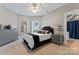 Spacious bedroom with plush bed and gray dresser at 18805 Flat Shoals Dr, Cornelius, NC 28031