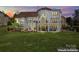 Stunning home exterior with large backyard and lake view at 18805 Flat Shoals Dr, Cornelius, NC 28031