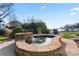 Relaxing stone hot tub with water feature, overlooking the lake at 18805 Flat Shoals Dr, Cornelius, NC 28031