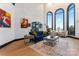 Bright and airy living room with lake views and comfortable seating at 18805 Flat Shoals Dr, Cornelius, NC 28031