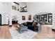 Spacious living area with high ceilings, hardwood floors, and stylish furniture at 18805 Flat Shoals Dr, Cornelius, NC 28031