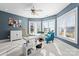 Sunlit home office with lake view and built-in desk at 18805 Flat Shoals Dr, Cornelius, NC 28031