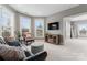 Relaxing sitting area with comfortable seating and large windows at 18805 Flat Shoals Dr, Cornelius, NC 28031